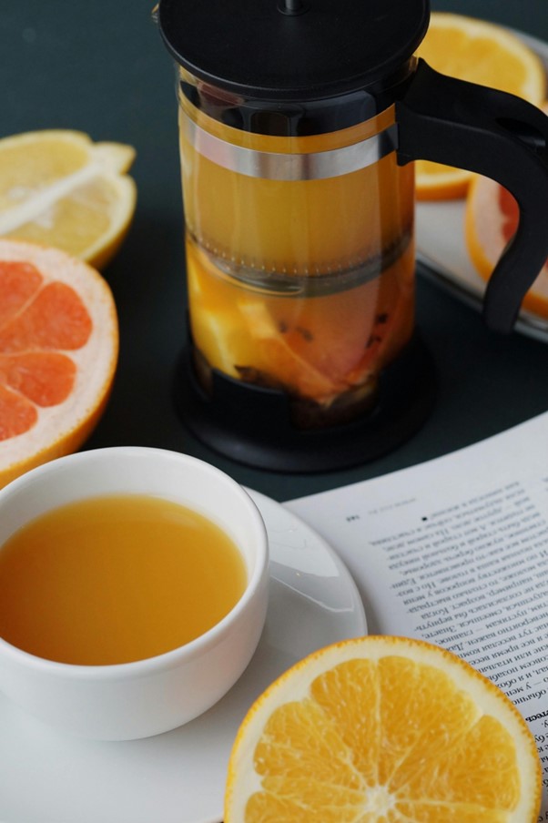 “Refreshing citrus and ginger herbal tea blend designed to uplift mood and support immunity.”
